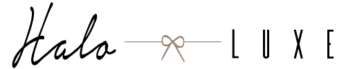 Halo Luxe logo in black text featuring a beige bow icon centered between the words.